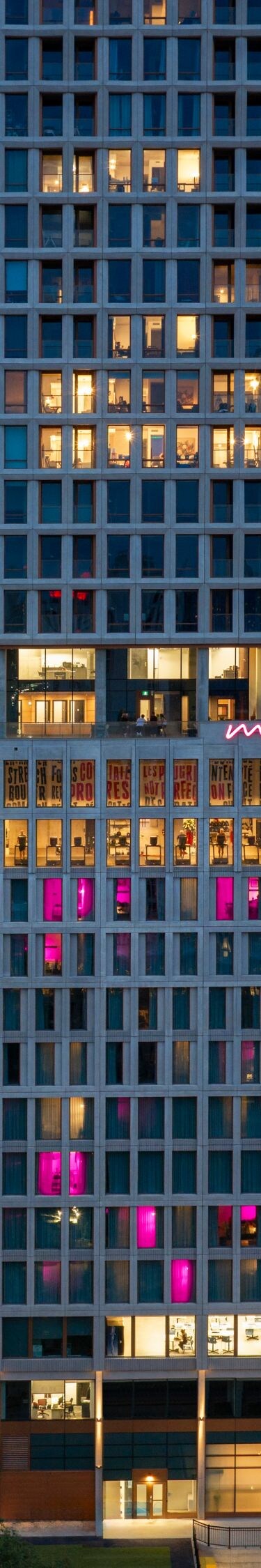Moxy Montreal hotel exterior at dusk