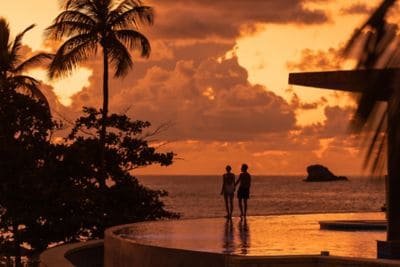 Silhouette of a couple watching the sunset