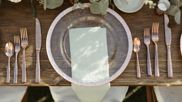 Wedding table scape with rose tone colors.