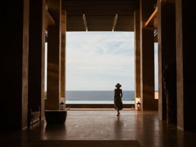 A woman overlooking the ocean in Los Cabos.