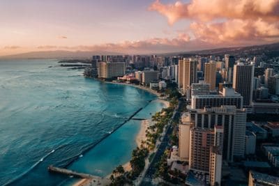 Oahu Waikiki Hawaii drone skyline pink clouds