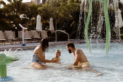 Family in lap pool in Orlando resort pool