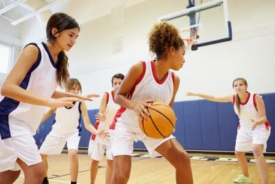 Youth sport girls playing basketball