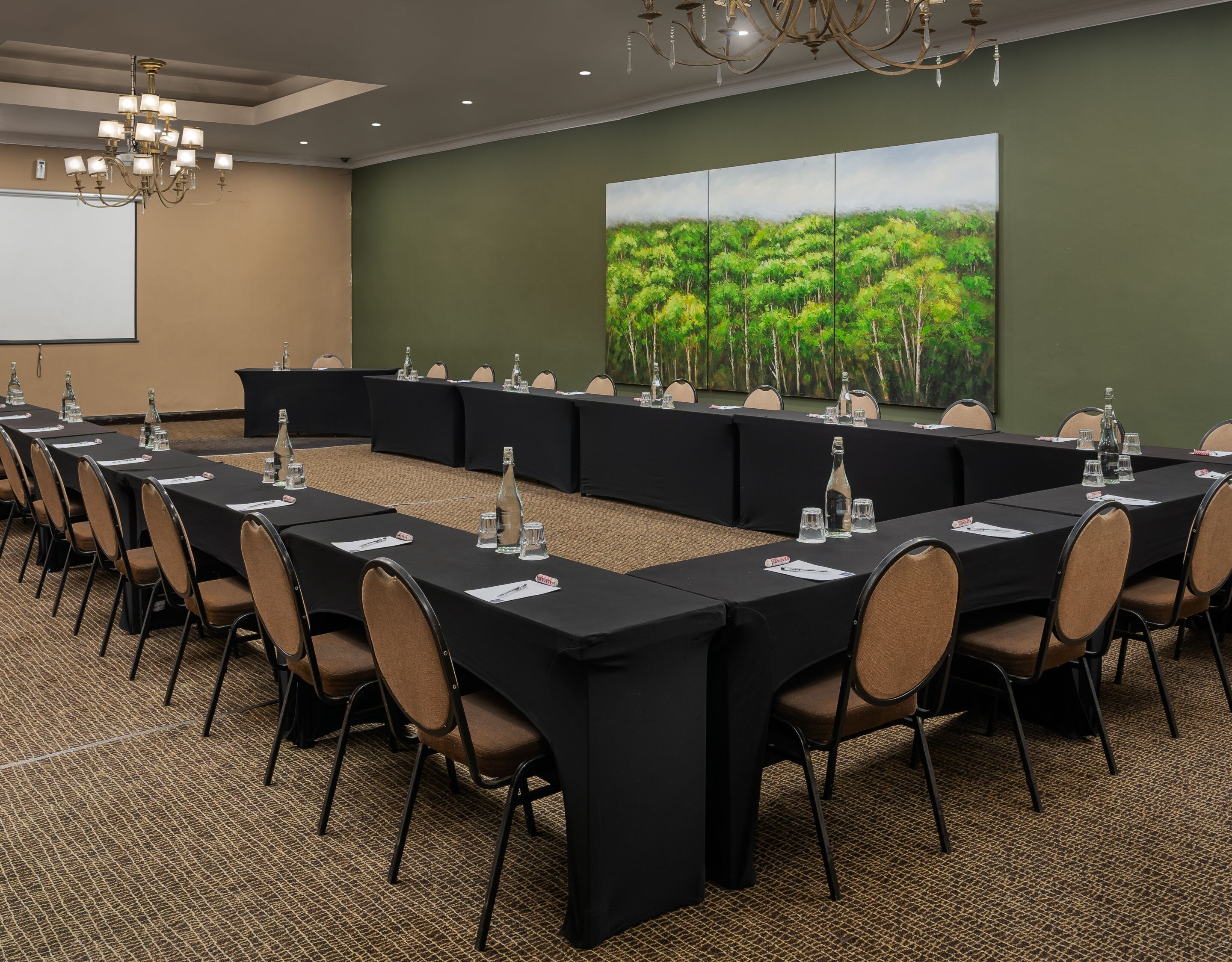 projector, chandeliers, u-shape table setup