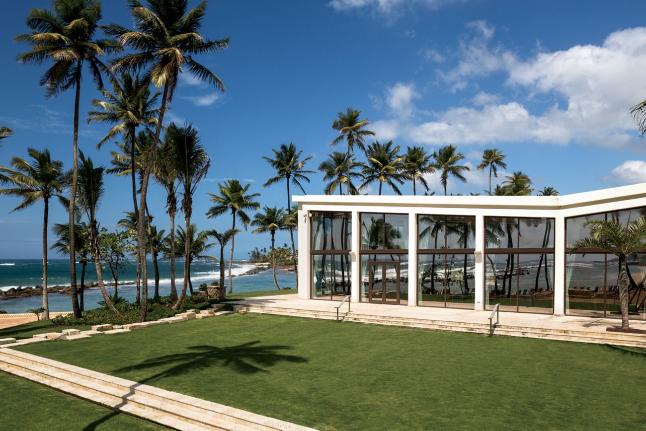 Outdoor space with large windscreen and beachfront and ocean views