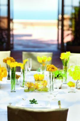 Event table set with yellow flowers