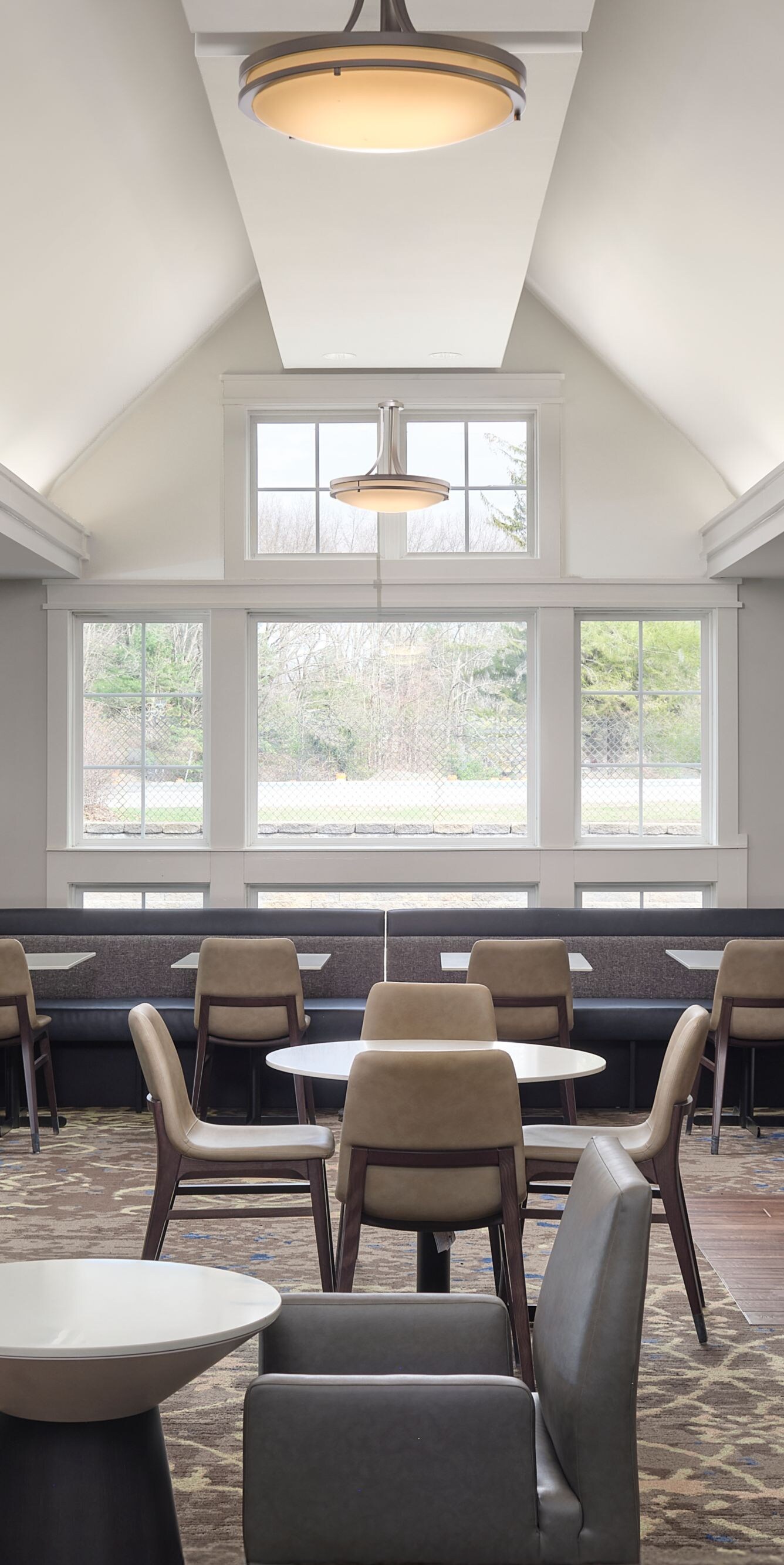Spacious dining area with tables and chairs