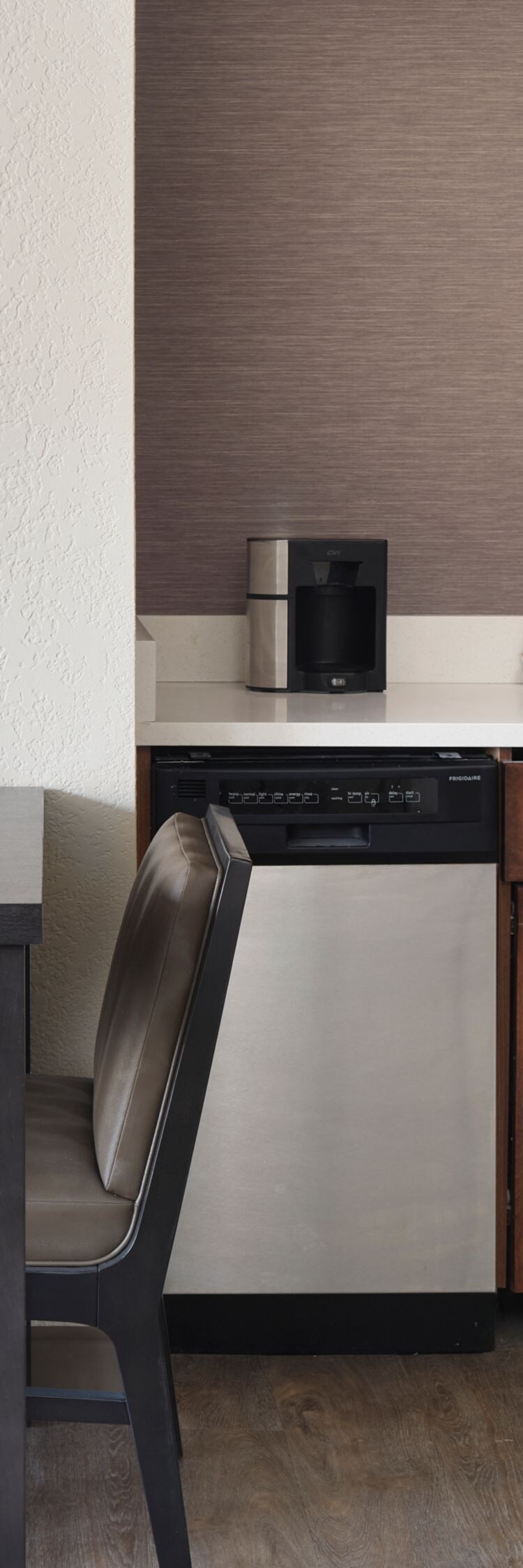 In-room kitchenette with table and two chairs