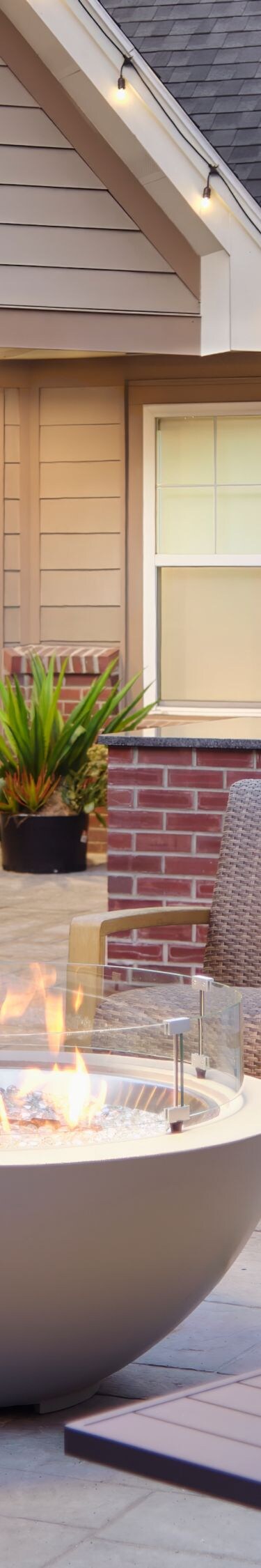 Outdoor Courtyard with a grill and a fire pit