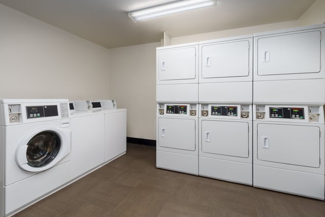 Guest laundry with washing machines and dryers