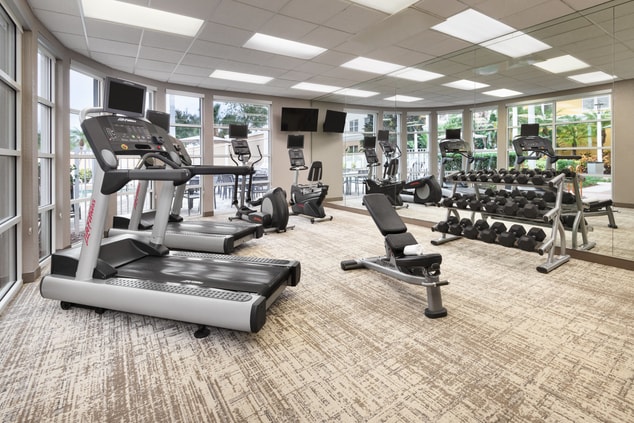 fitness center with treadmil, elliptical & weights