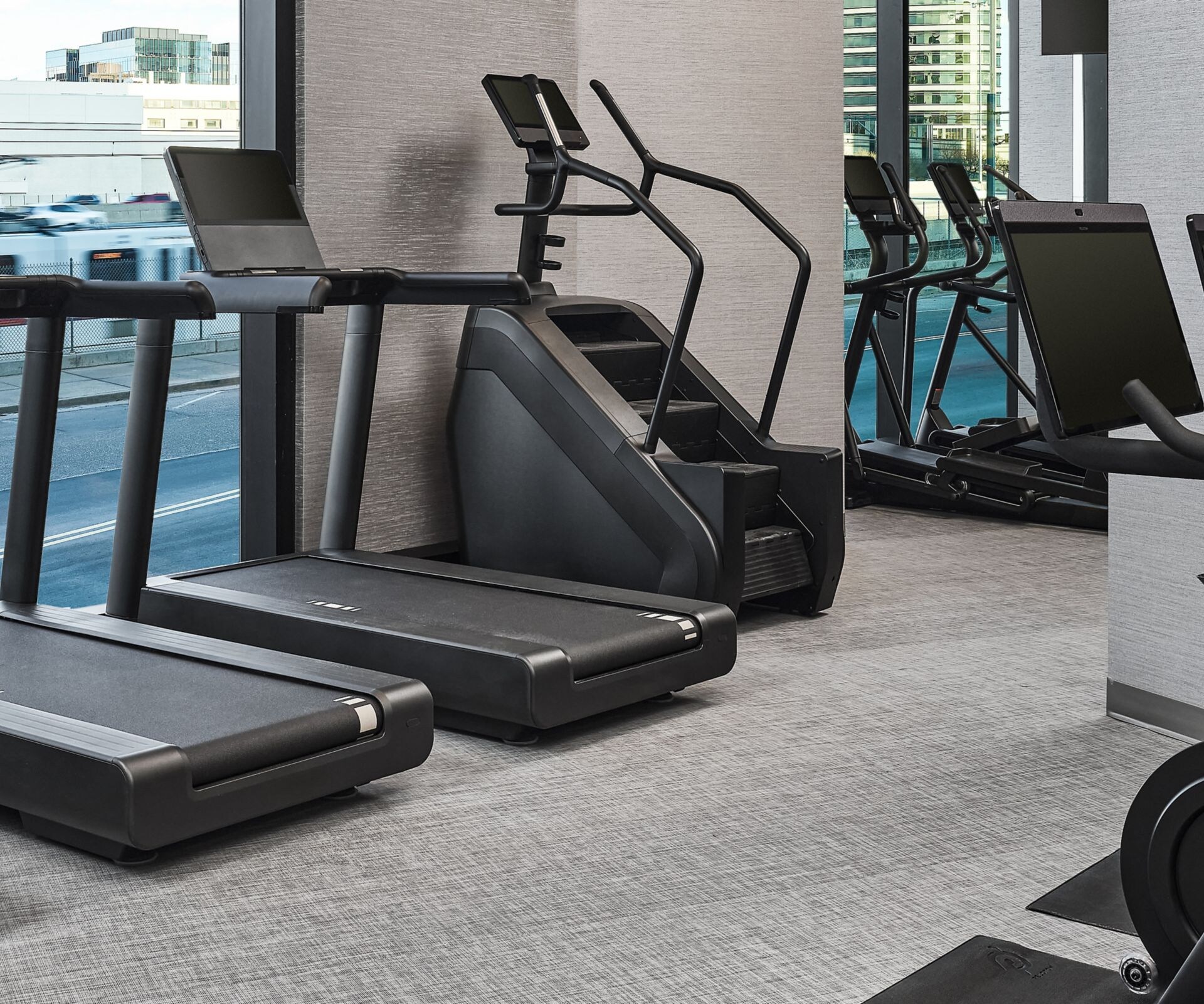 Modern fitness center at Apiary Hotel