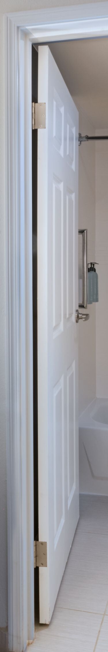 Suite bathroom vanity and shower tub