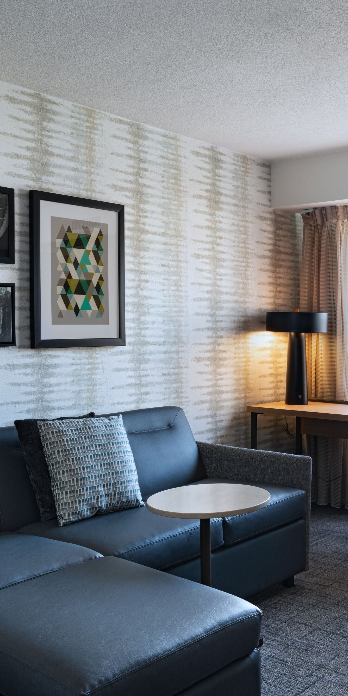 One-bedroom suite living room and desk