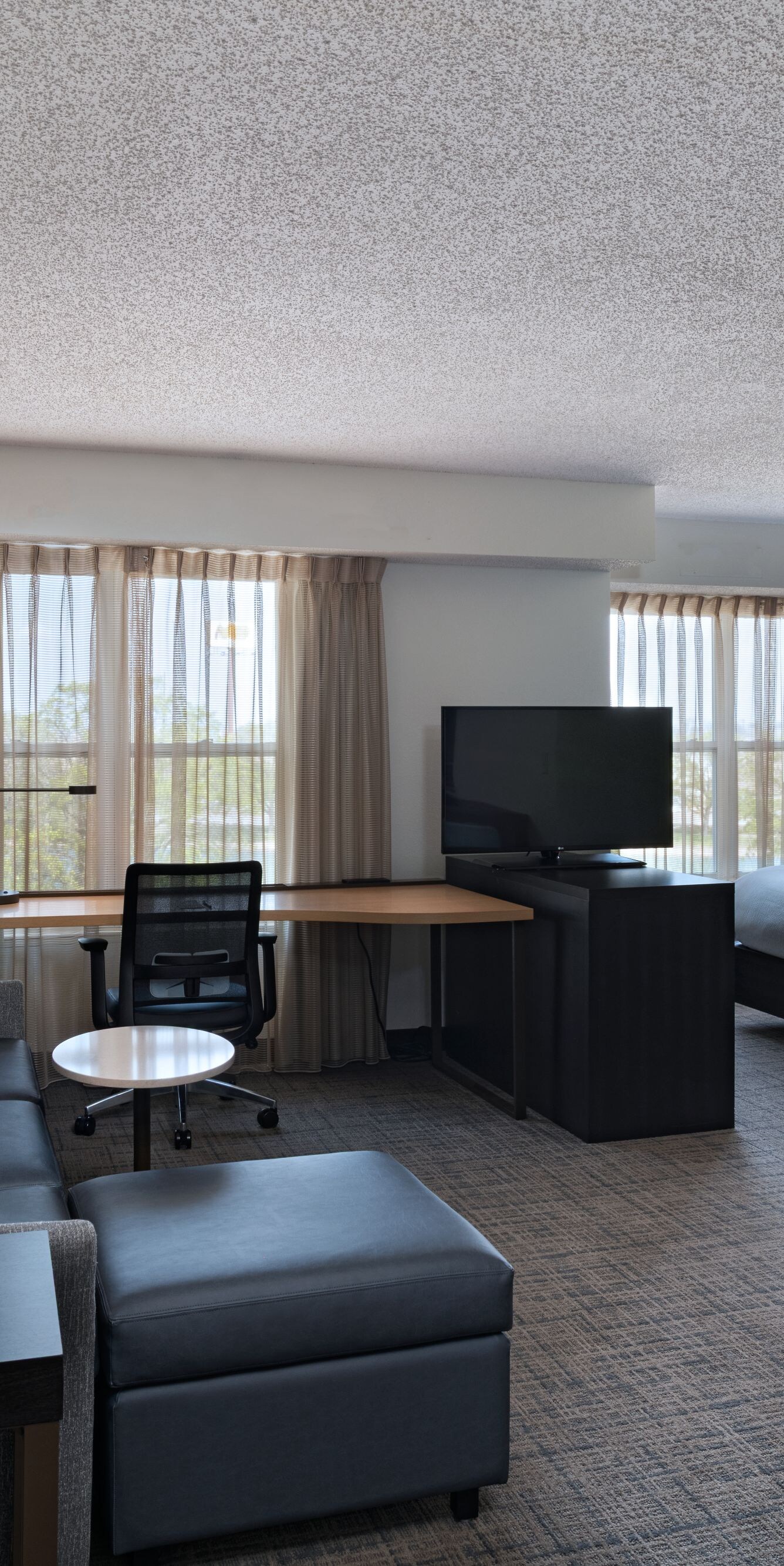 King studio suite living area and work desk