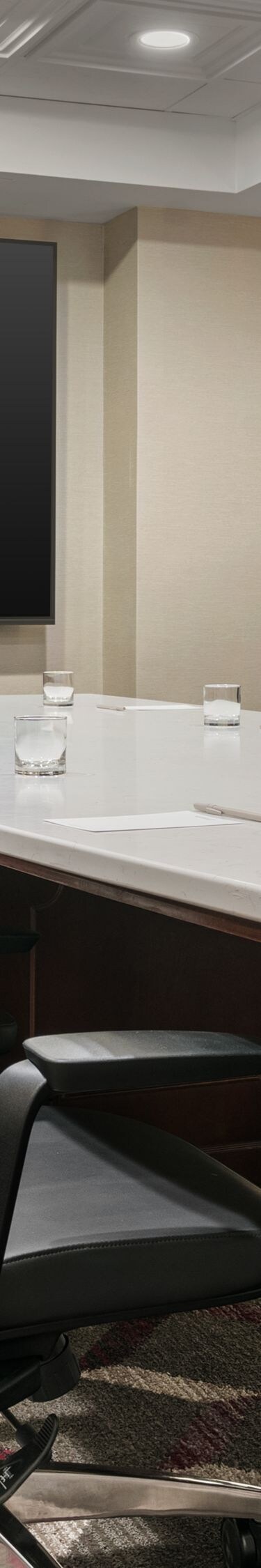 Boardroom with conference table and chairs