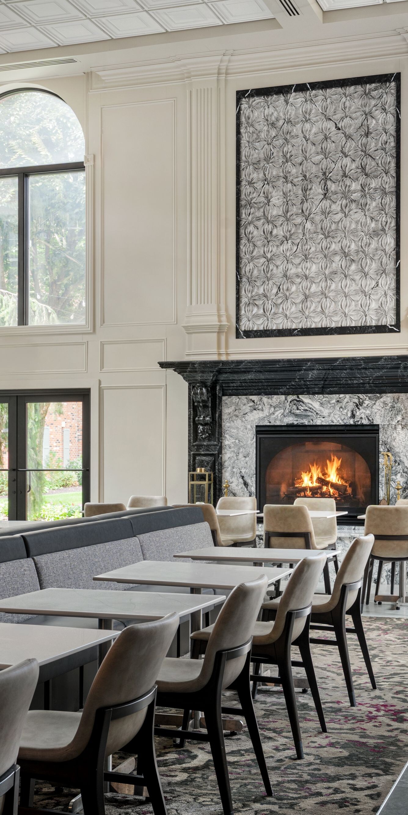 Seating area for breakfast in lobby with fireplace