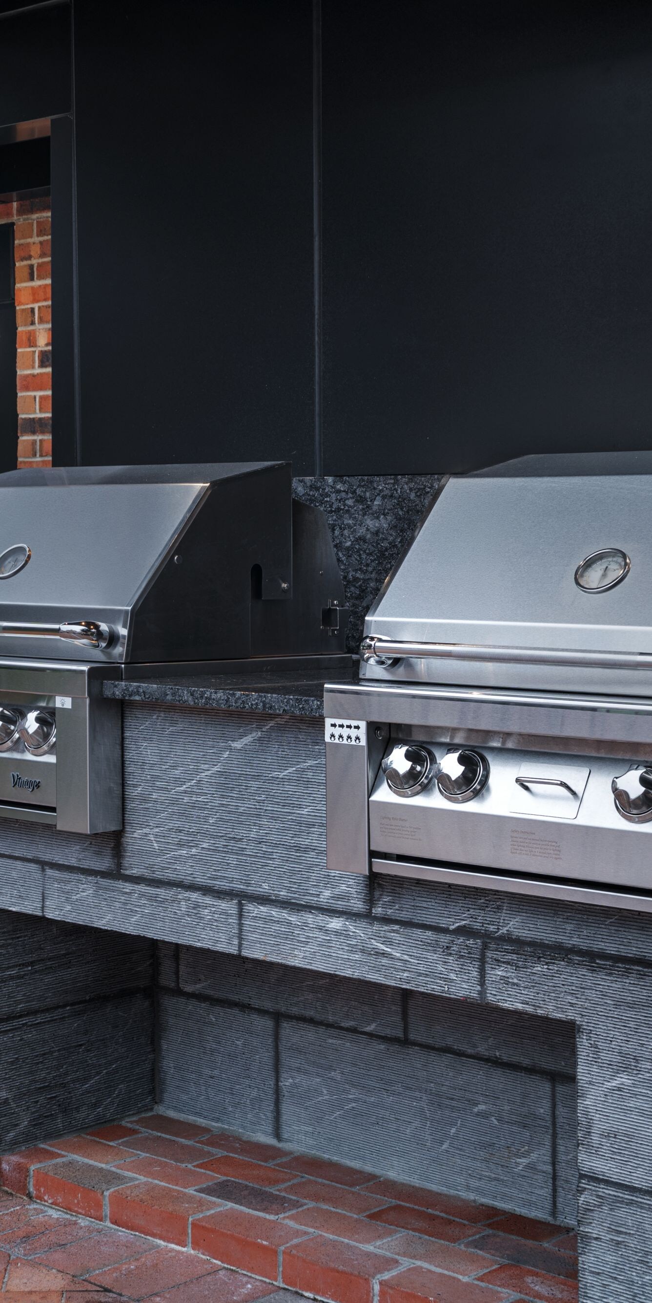 Built-in grill area in courtyard of property