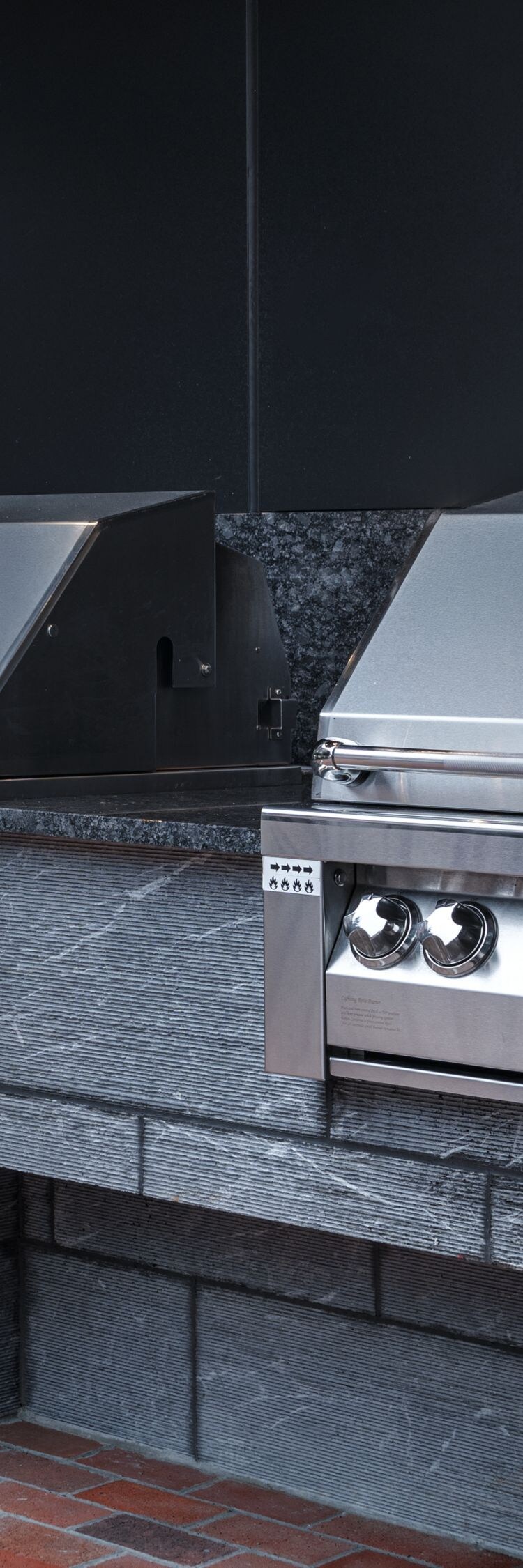 Built-in grill area in courtyard of property