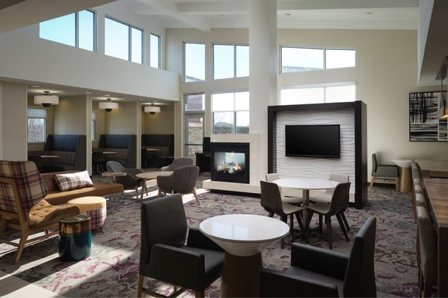 Lobby seating, fireplace, television