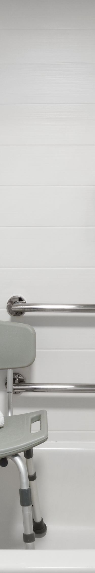 Accessible bathtub with seat and grab bars