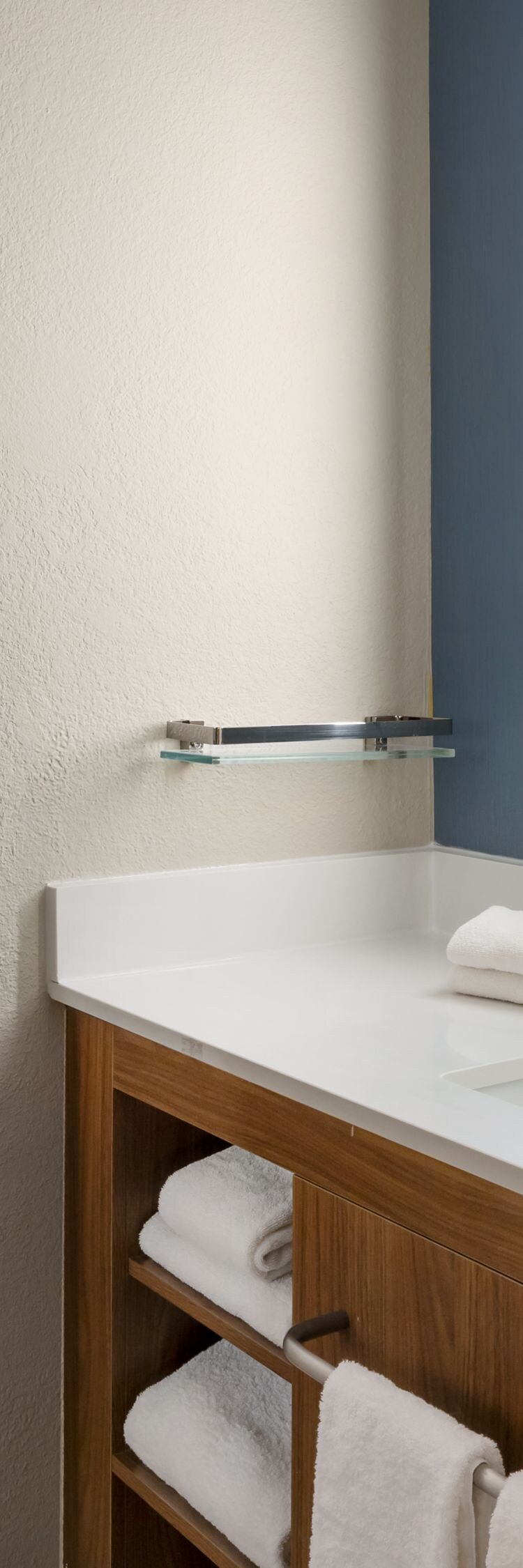Bathroom with spacious vanity and walk-in shower