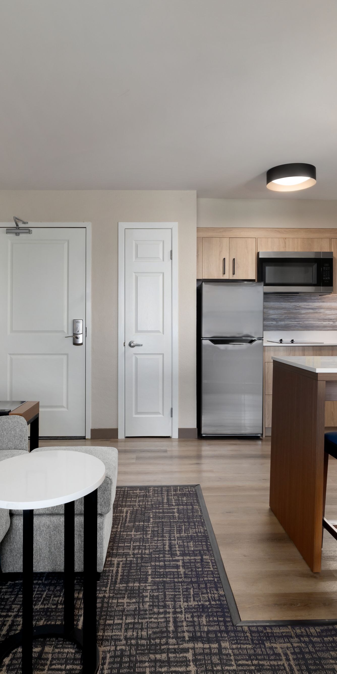 Living, dining and kitchen areas of suite
