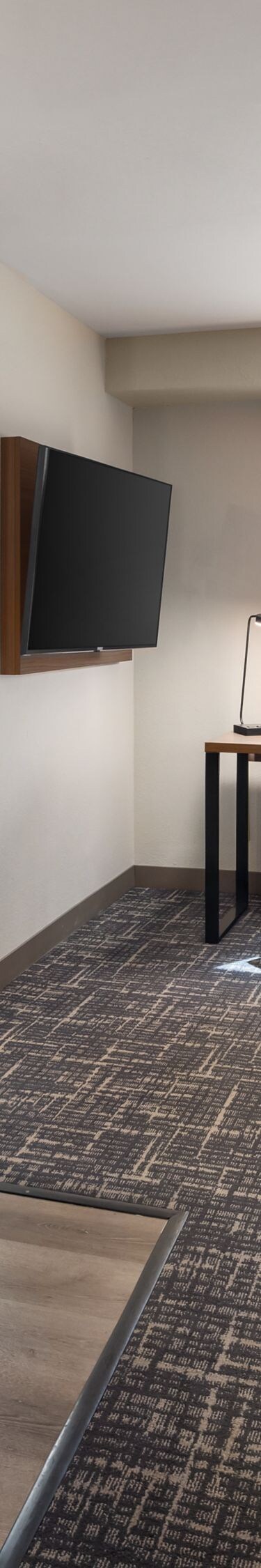 Living and dining area of suite