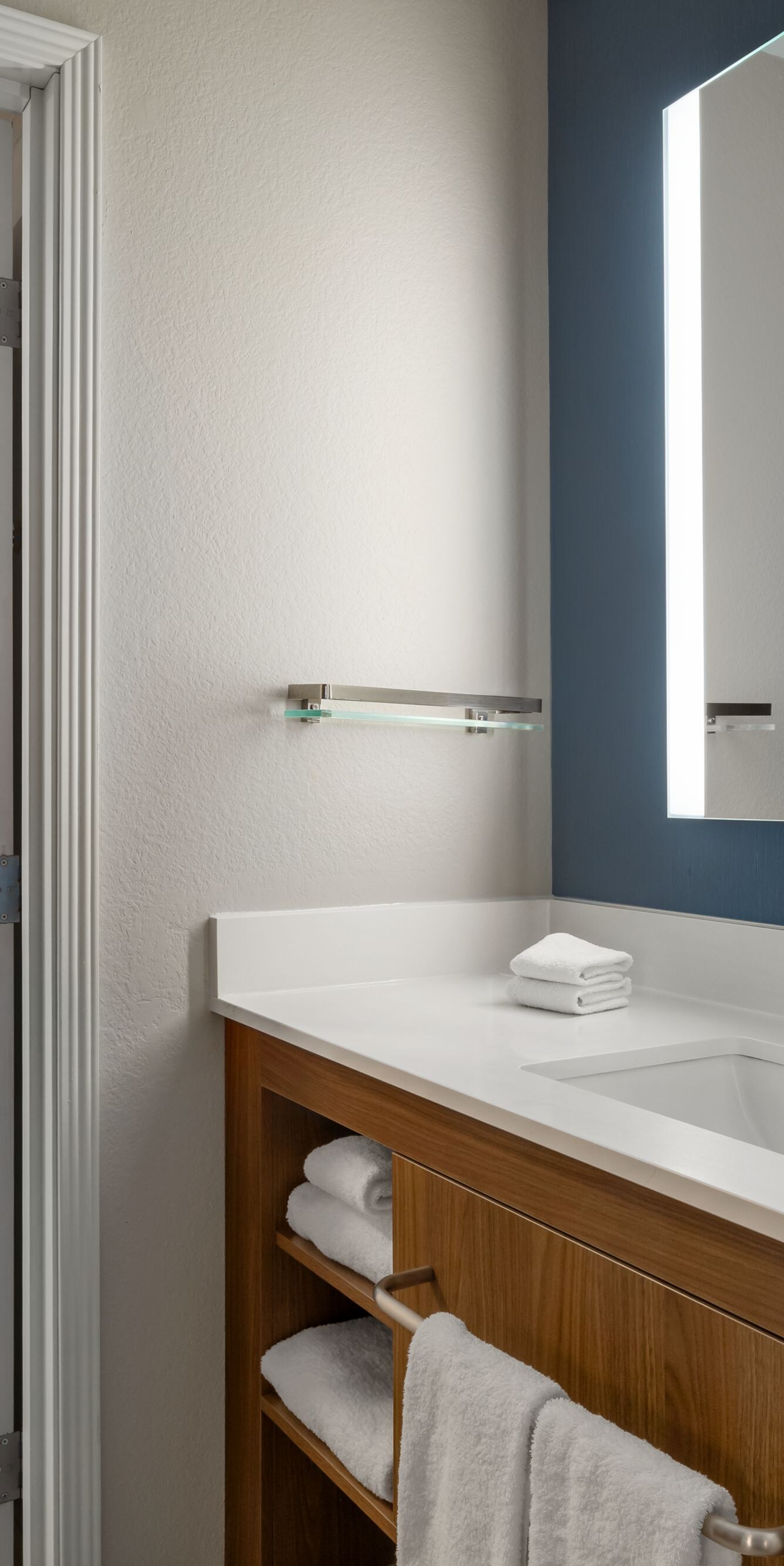 Bathroom with tub and large vanity