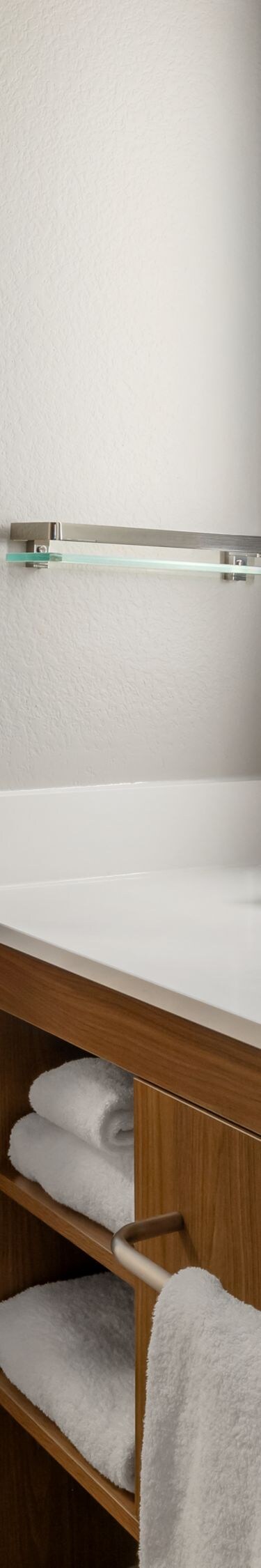 Bathroom with tub and large vanity