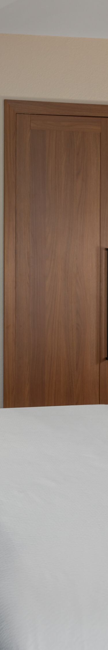 Bedroom and bathroom vanity in suite