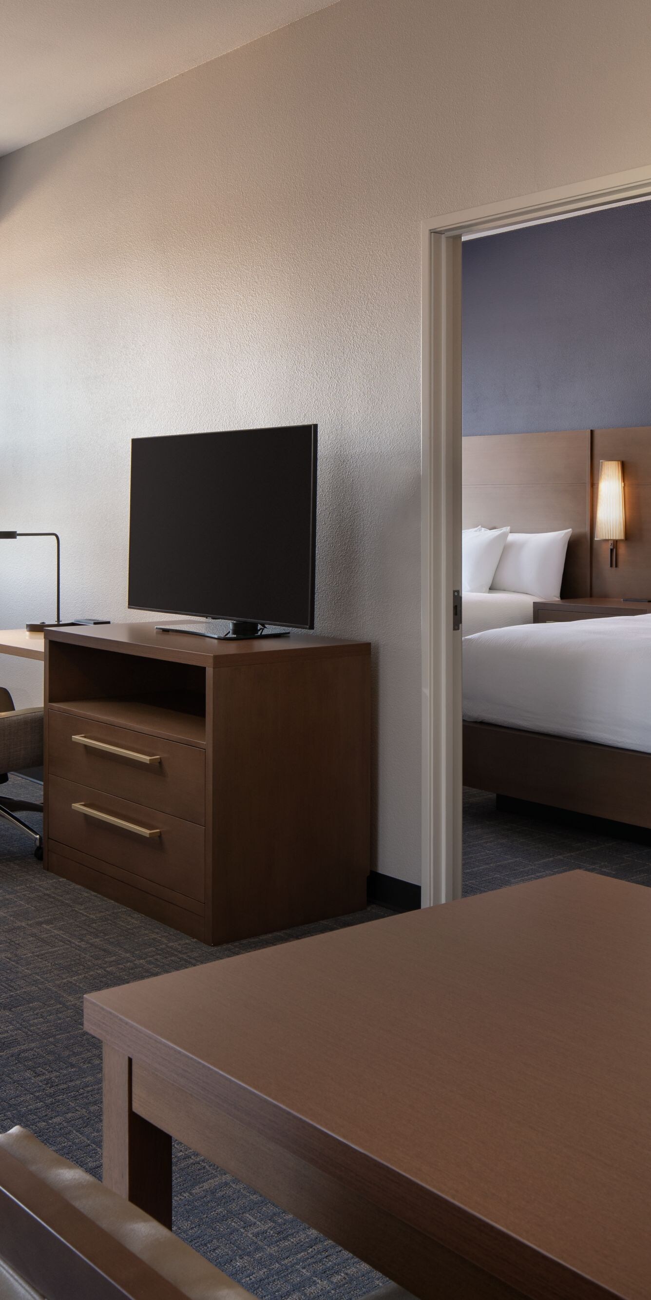 suite with 2 queen beds and living room