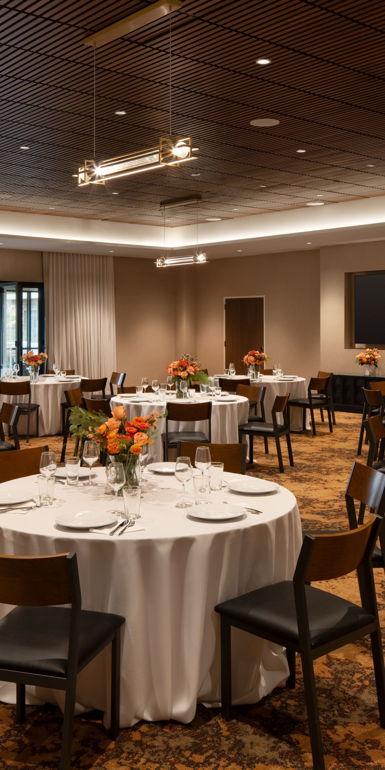 Ponderosa event space with round table setup