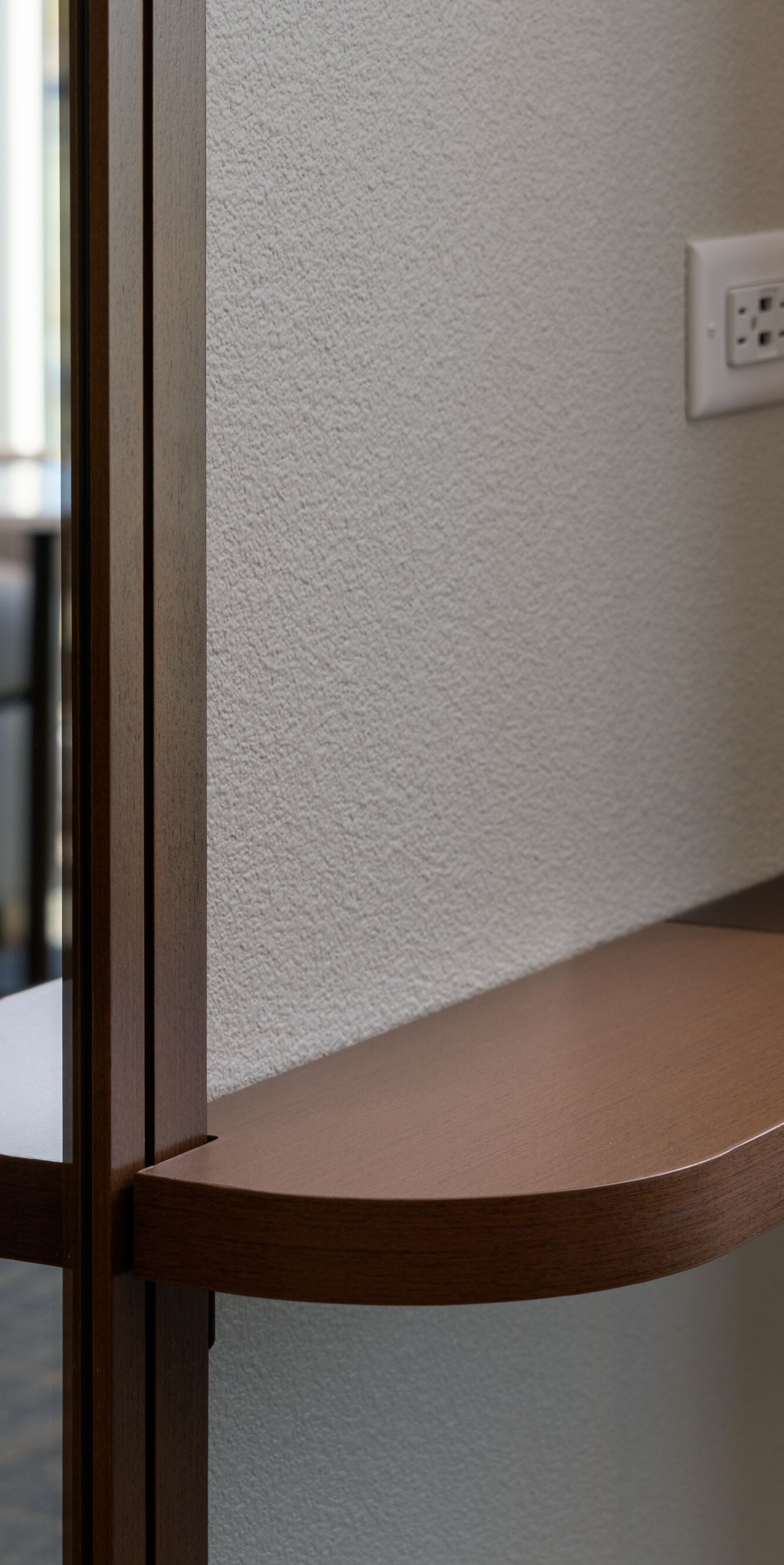 a Wallet and key holder featured in the room