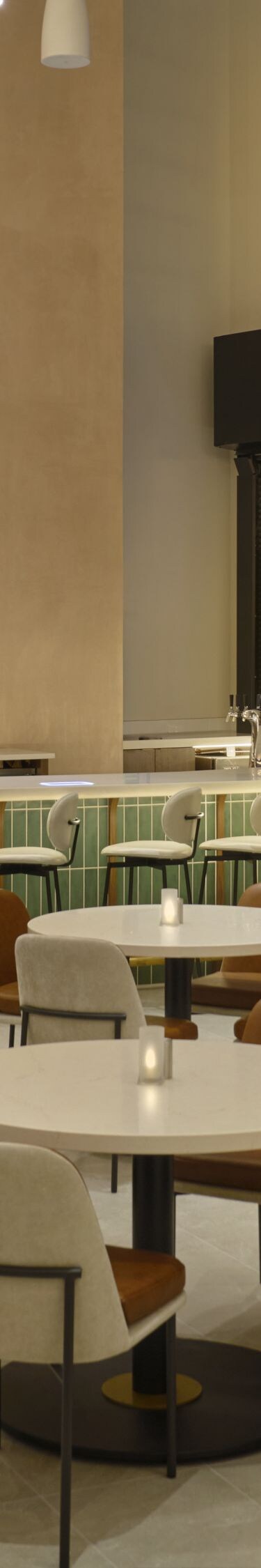tables, chairs, and a bar in a dining area