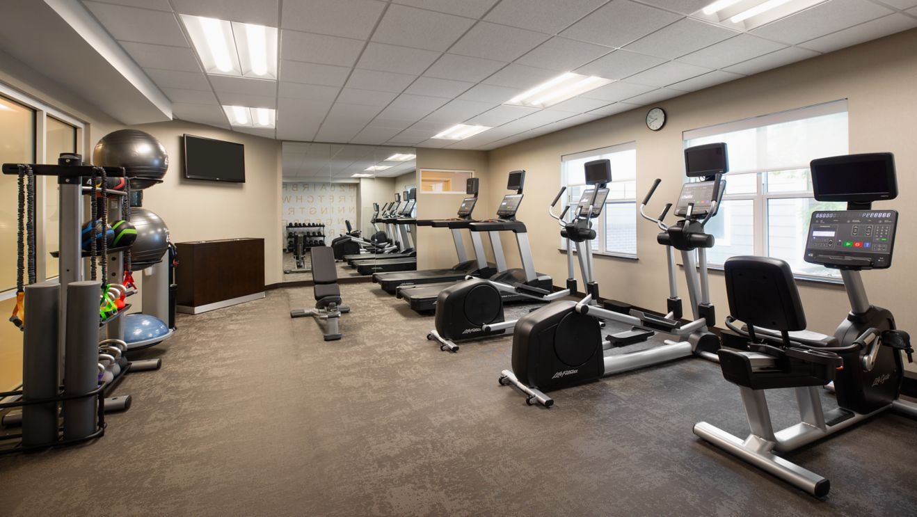 Fitness Center with cardio, free weights, and core