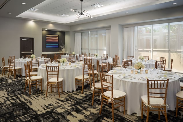 View of Ibis meeting space with formal table decor