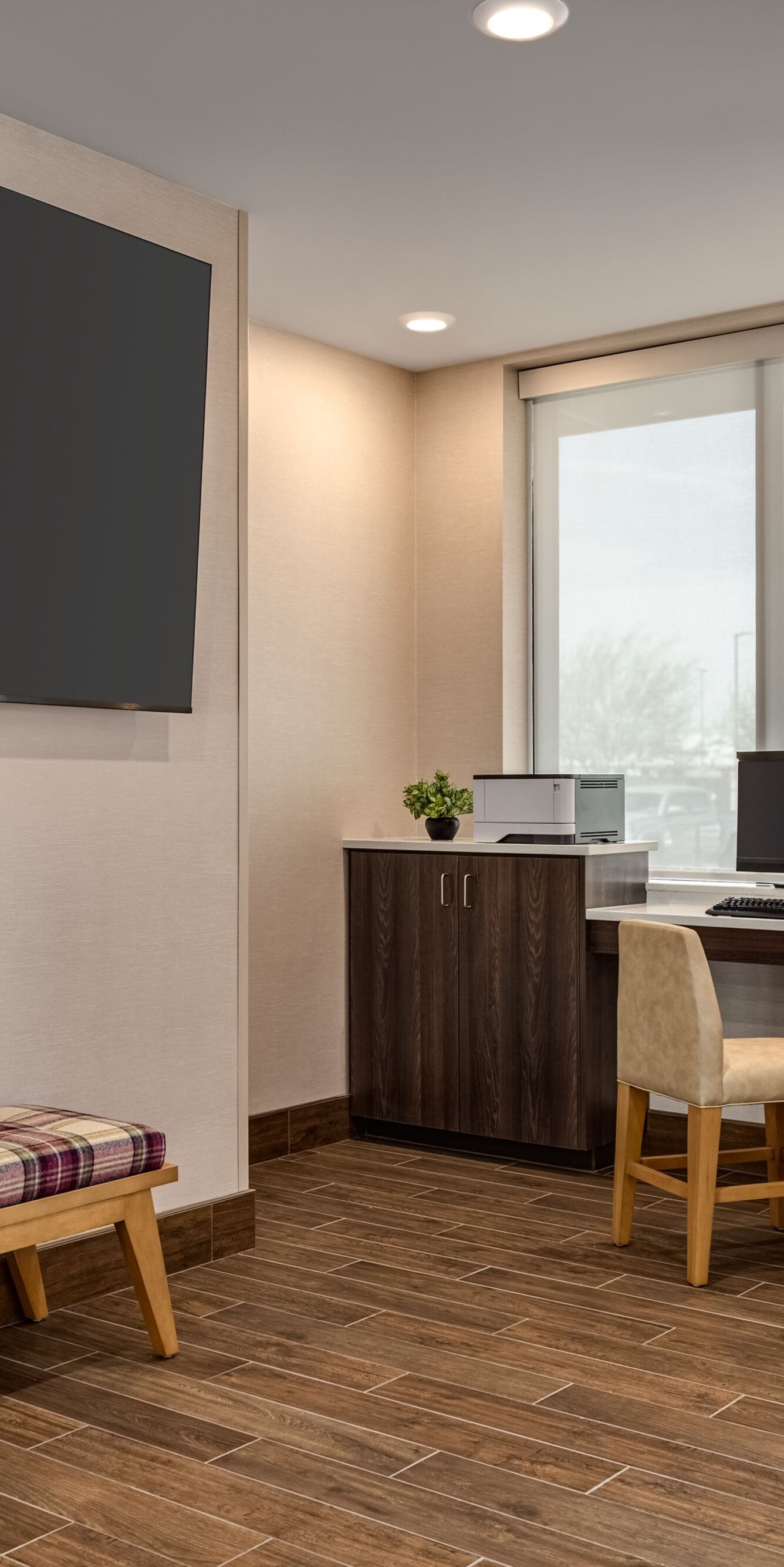 Computer workstation with printer in lobby