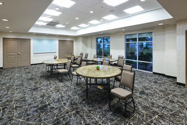 Meeting Room Space with Tables and Chairs 