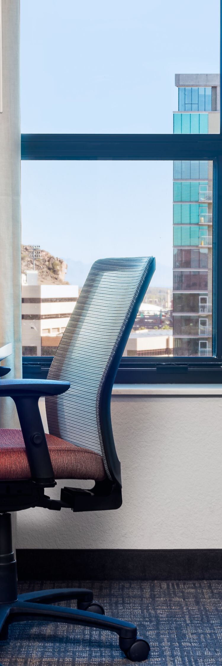desk, chair, tv, dresser, sofa, windows