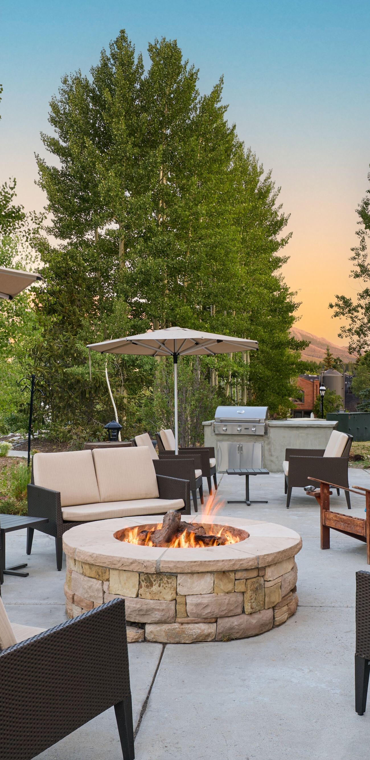Patio with lounge seating around a fire pit