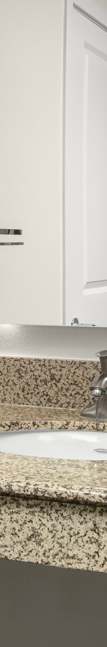 Accessible bathroom vanity with sink and mirror