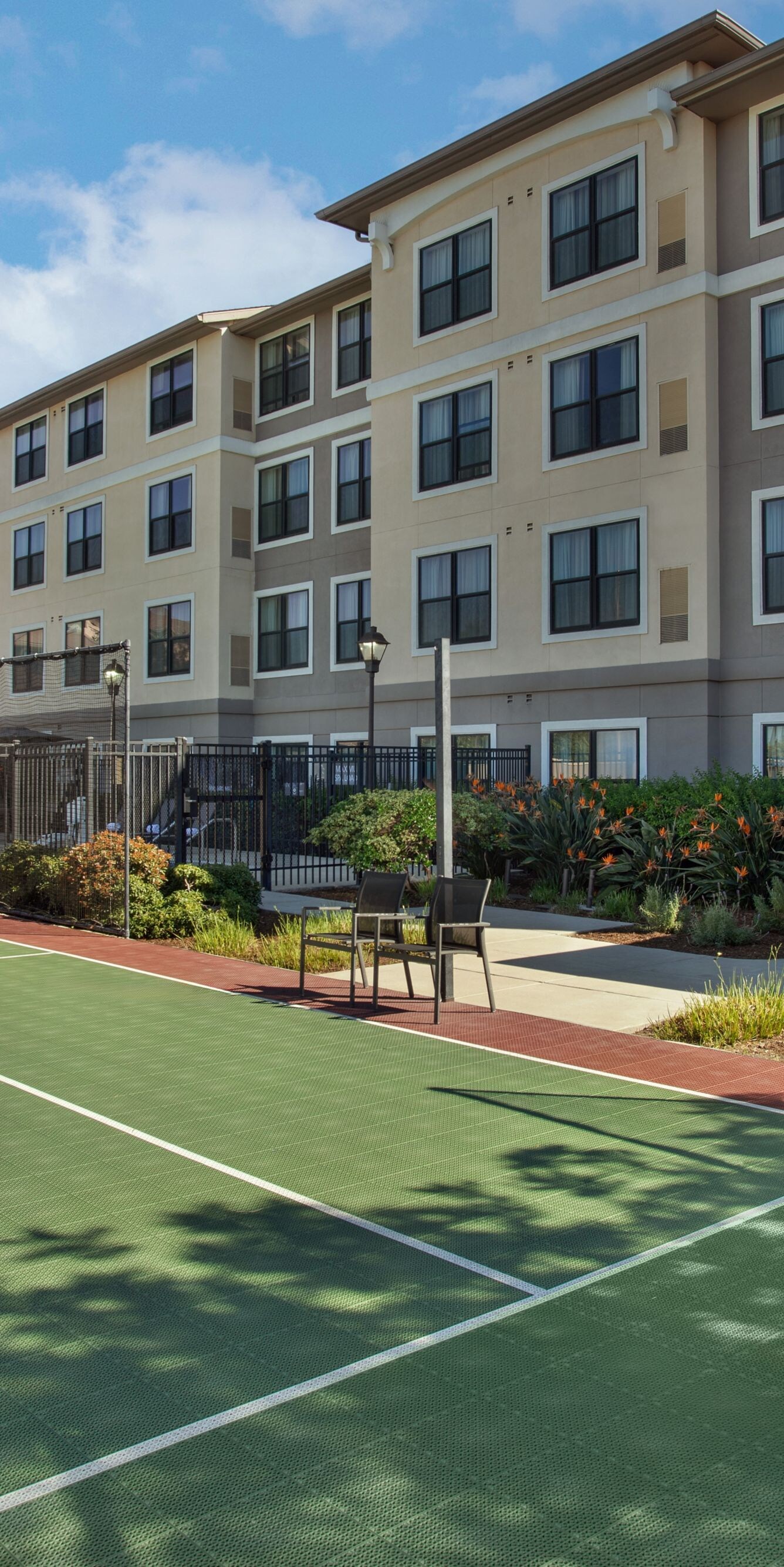 Hotel basketball court with hoop and netting