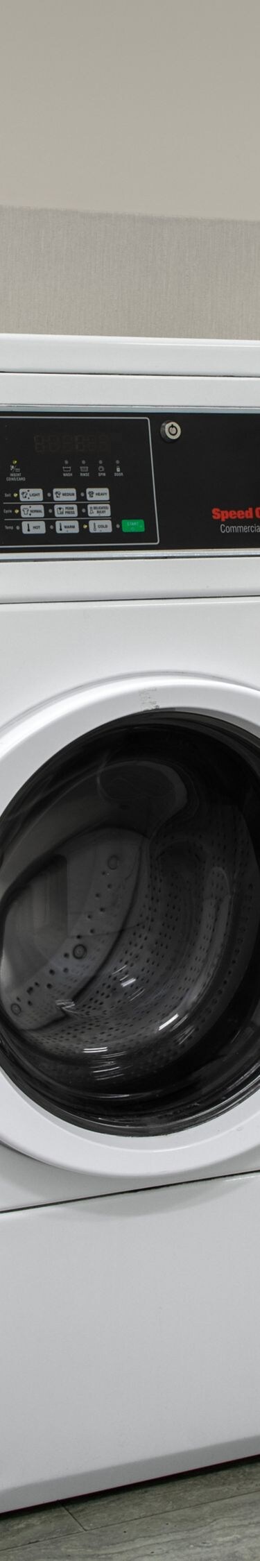 Laundry room with washers and dryers