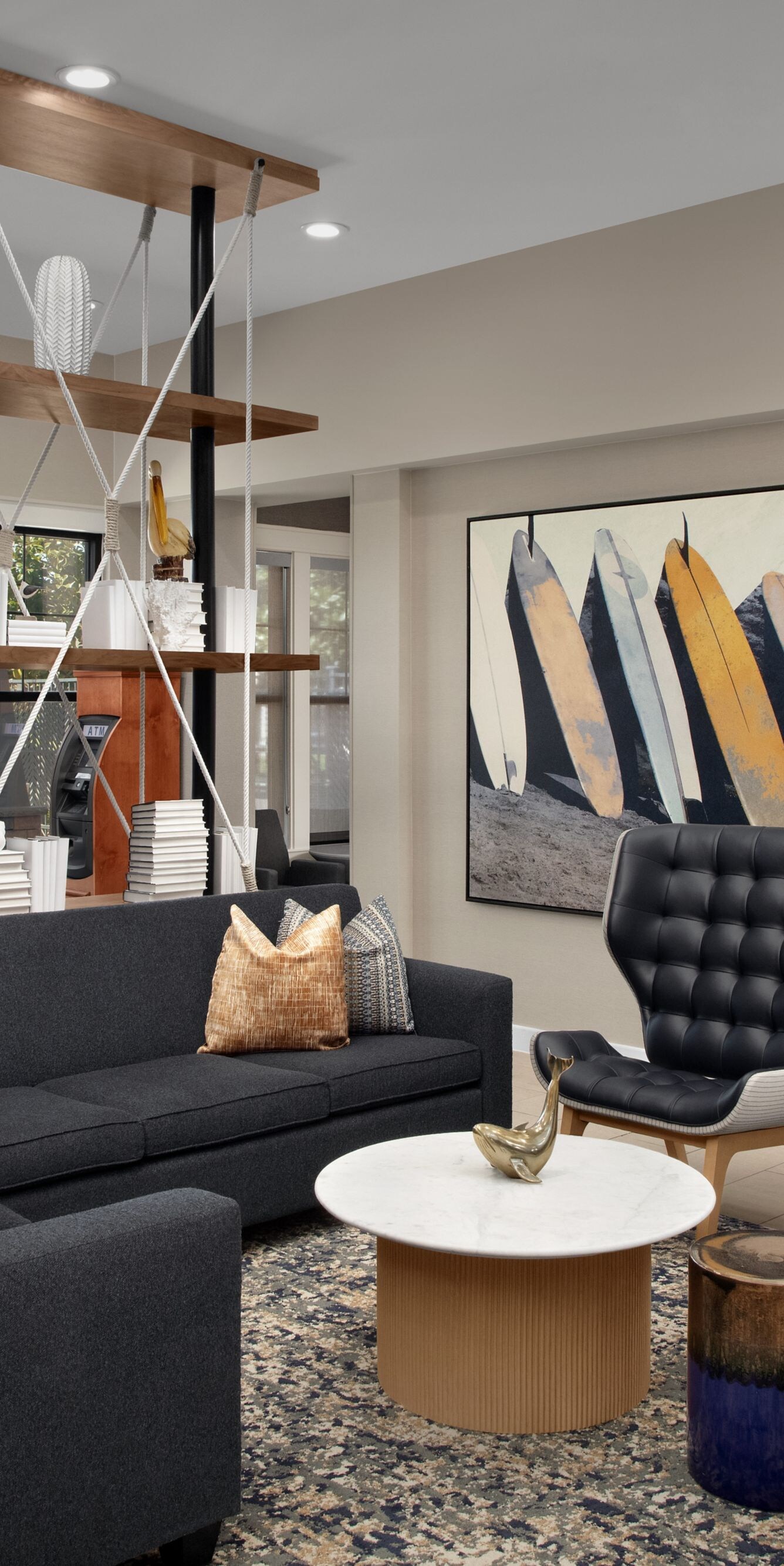 Hotel lobby seating area with sofa and chairs