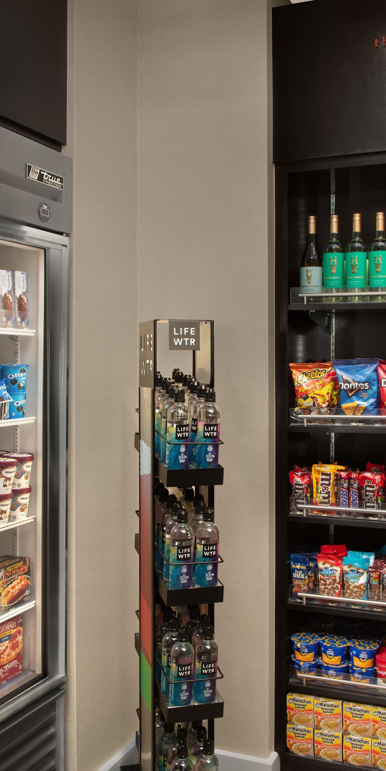 Hotel market with snacks, drinks, and cooler