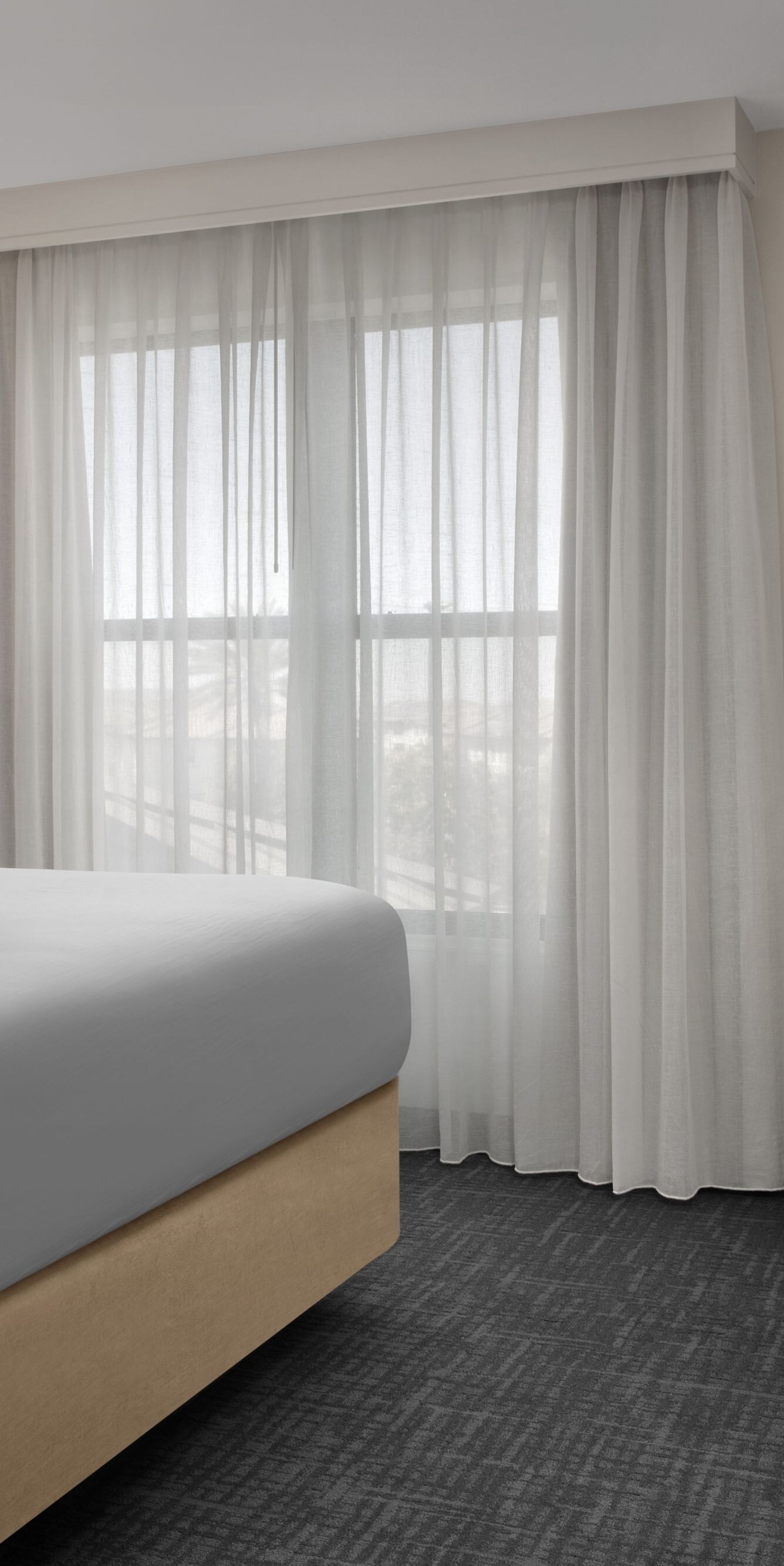 One-bedroom suite with king bed and window