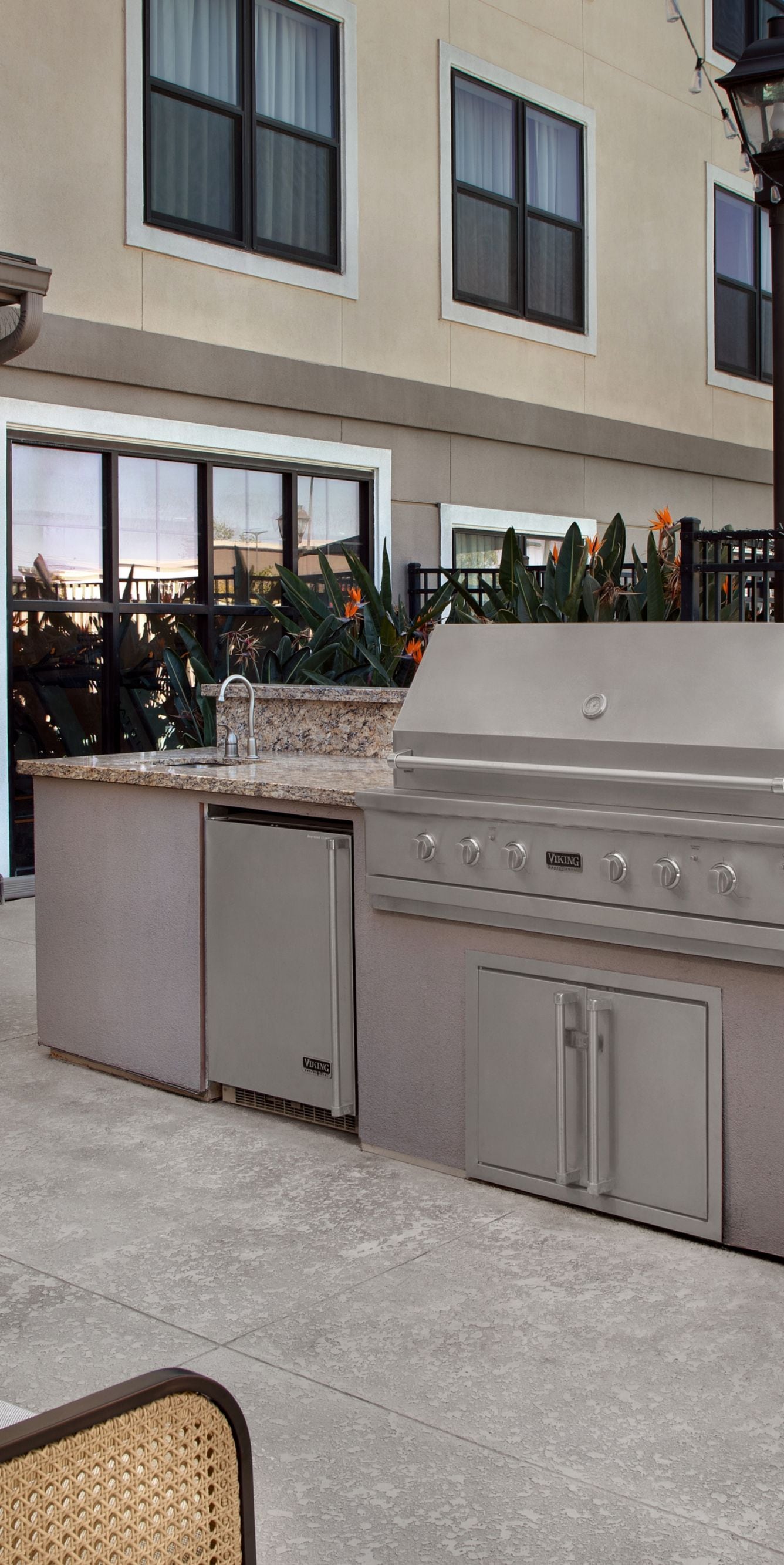 Outdoor patio with barbecue grill and seating