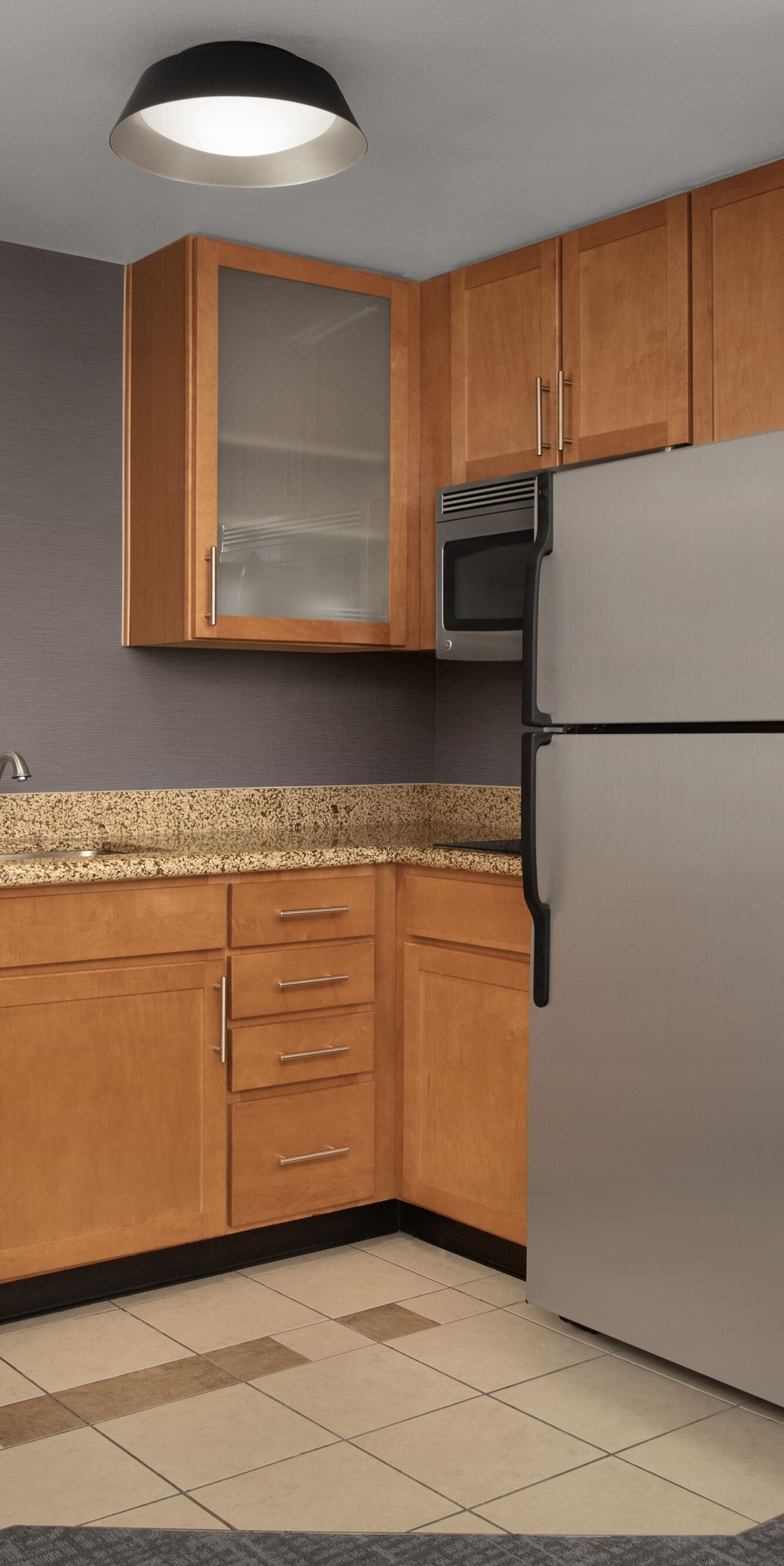 Kitchen area with appliances and table