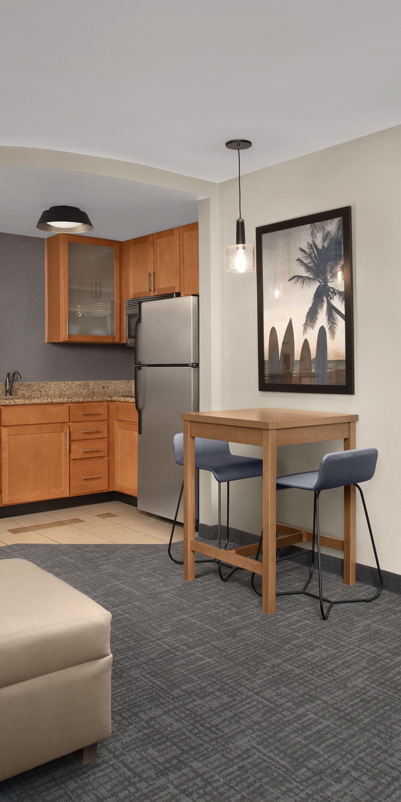 Studio Suite with kitchen, living, and bedroom